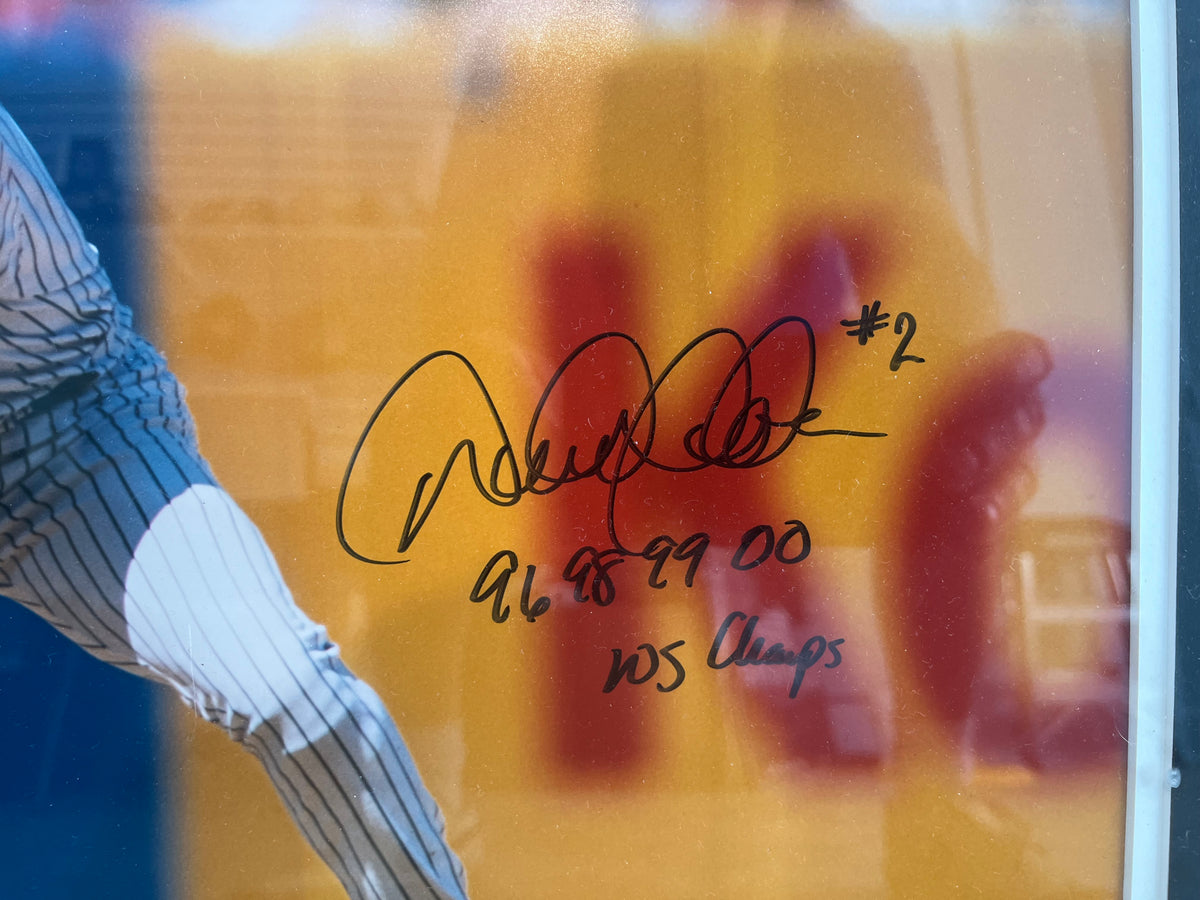 DEREK JETER YANKEES CAPTAIN SIGNED GORGEOUS FRAMED PHOTO W/ GREAT WORLD SERIES INSCRIPTION CONTENT- $650